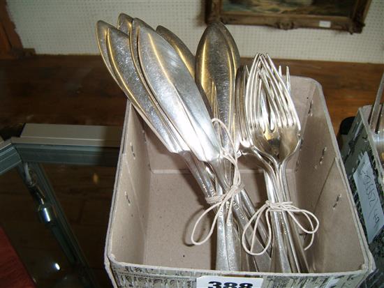 A set of 12 George V silver fish knives and 5 fish forks